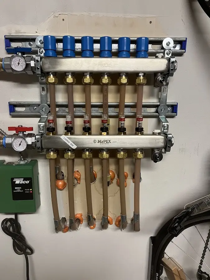 Plumber performing Leak Detection at a residential property in North College Hill